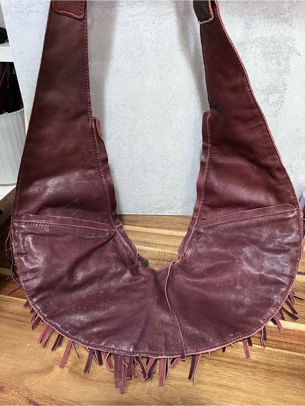 Sash Bag leather fringe crossbody bag in a rich merlot shade, featuring a distin - Picture 2 of 6